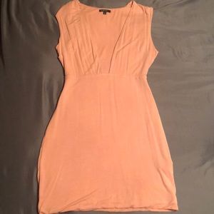 Mini light pink dress with open chest
